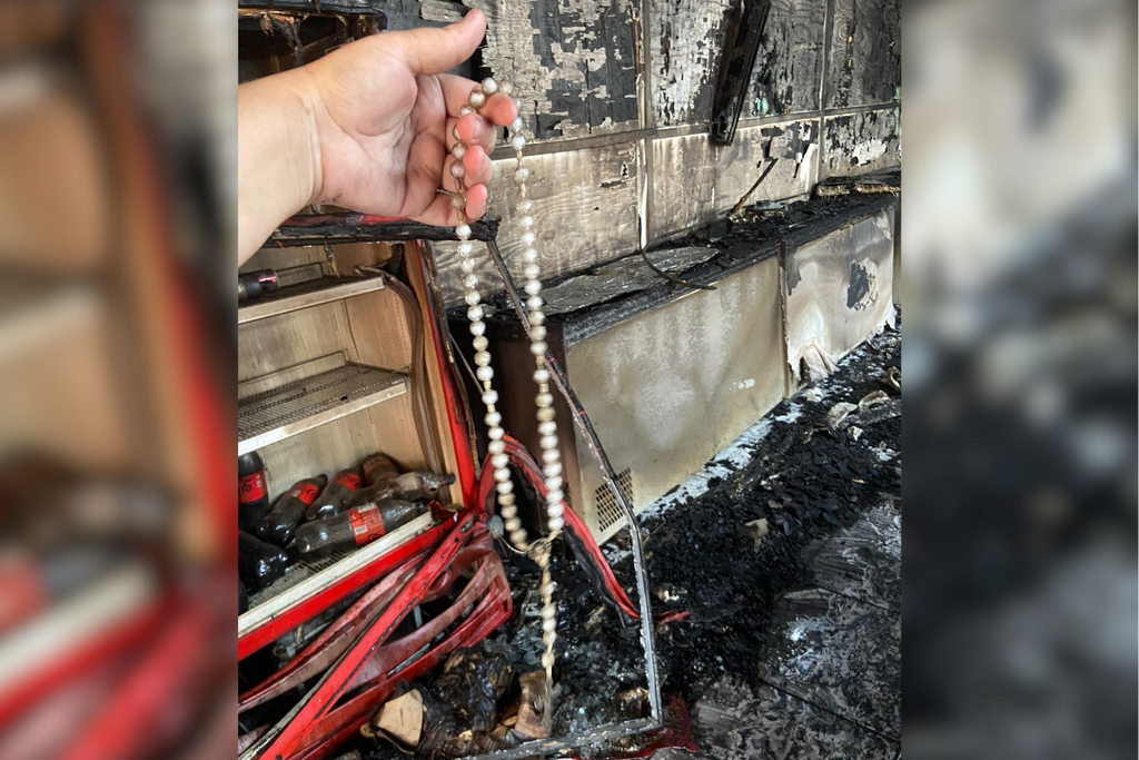 Foto de crucifixo preservado emociona família após incêndio destruir sorveteria em Camobi